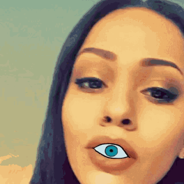 a close up of a woman 's face with an eye in her mouth