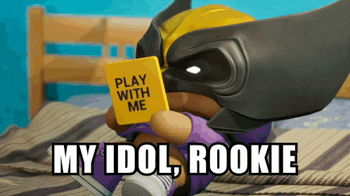 a toy wolverine is reading a book that says play with me my idol rookie