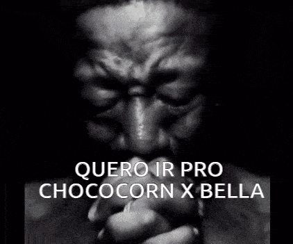 a black and white photo of a man praying with the words " quero ir pro chococorn x bella " below him