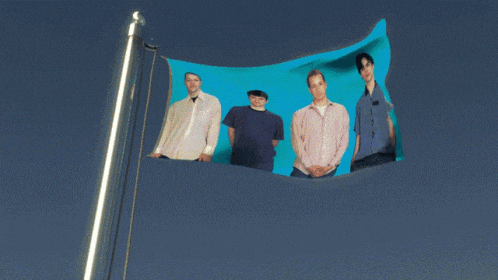 a flag with a picture of a group of men on it
