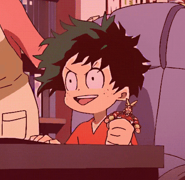 a cartoon character is sitting at a desk holding a toy .