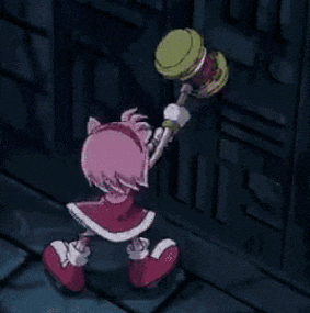 amy rose from the video game sonic the hedgehog is holding a hammer in her hand .