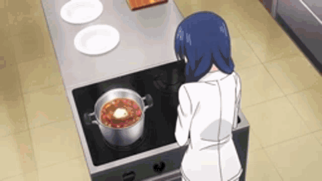 a woman is cooking food on a stove in a kitchen .