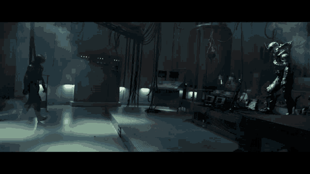 a dark room with a clock on the wall that reads 00