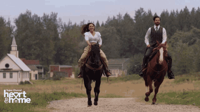 a man and a woman are riding horses on a dirt road with the words channel heart & home written on the bottom