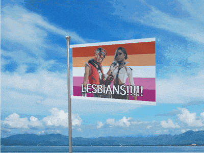 a flag with a picture of two women and the words lesbians !!!