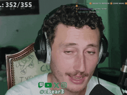 a man wearing headphones with the number 352/355 on the bottom
