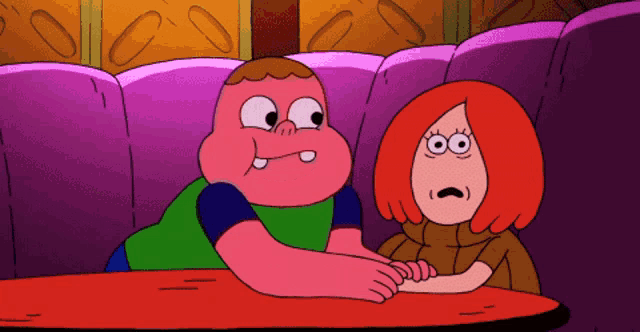 a couple of cartoon characters sitting on a couch