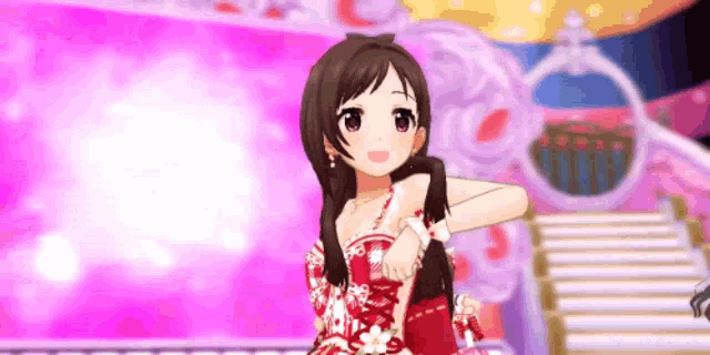 a girl in a red dress is standing in front of a pink background .