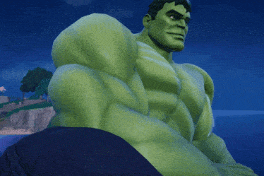 a close up of the hulk 's muscles against a dark blue sky