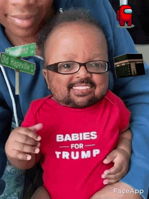 a baby wearing a red shirt that says " babies for trump "