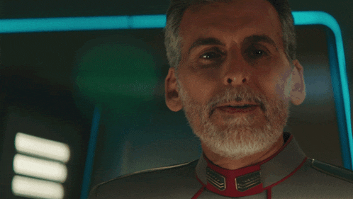 a man with a beard says good luck captain in a video