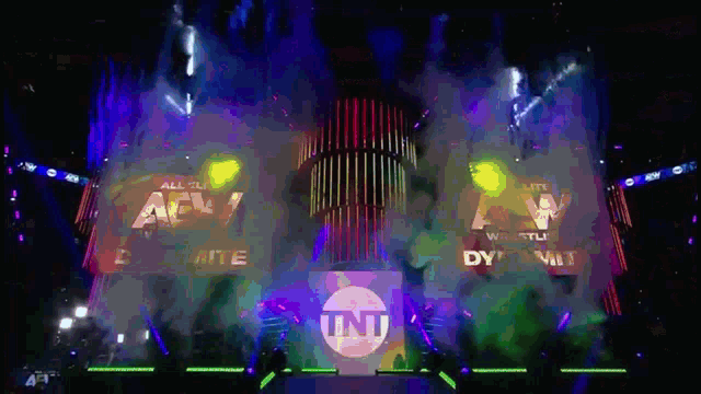 a tnt logo is projected on a large screen