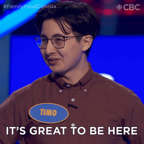 a man with a name tag that says timo