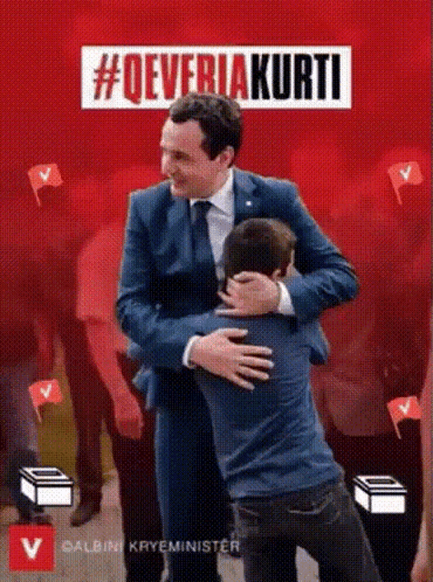 a man in a suit and tie is hugging another man in front of a red background that says #qeveriakurti
