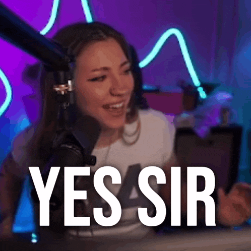 a woman is sitting in front of a microphone with the words yes sir above her