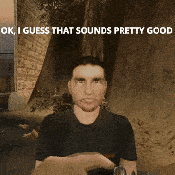 a man in a black shirt is holding a gun and says " ok i guess that sounds pretty good "