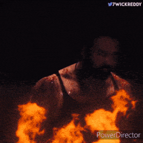 a man with a beard is standing in front of a fire with the words r & lgn written on it
