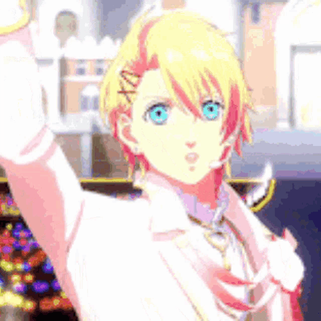 a boy with blonde hair and blue eyes is wearing a white suit and tie .