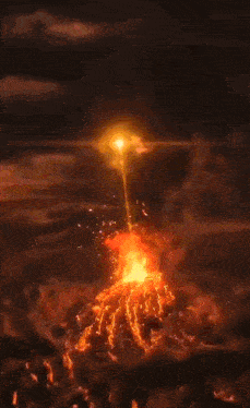 a painting of a person surrounded by flames on a dark background .