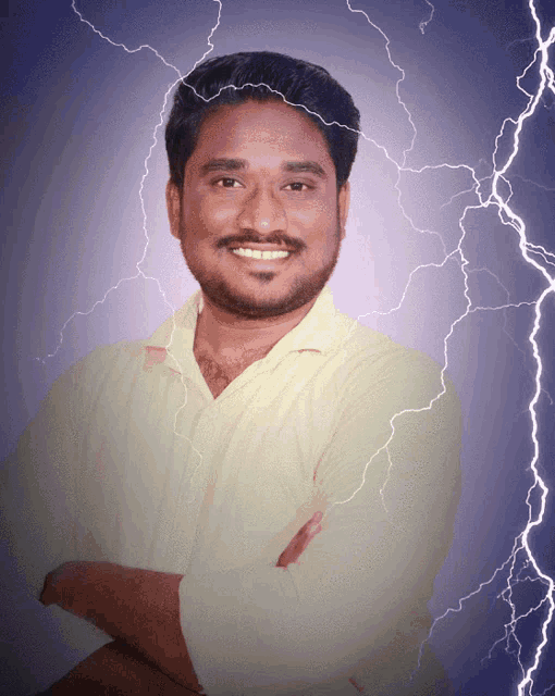 a man with his arms crossed has lightning behind him