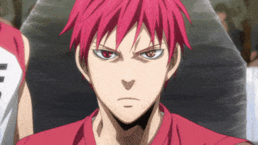 a close up of a person with red hair and a shirt that says ' e ' on it