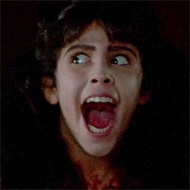 a close up of a person with their mouth wide open