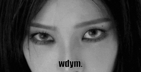 a black and white photo of a woman 's eyes with the word wdym written on it .