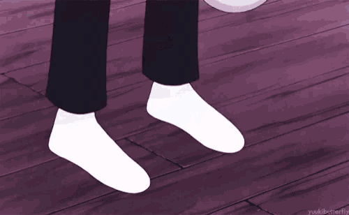 a person 's feet are shown with a purple background and the words yuukibutterfly below them