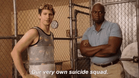two men are standing next to each other and one of them is saying " our very own suicide squad "