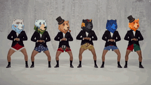 a group of men wearing bear masks are dancing in a row