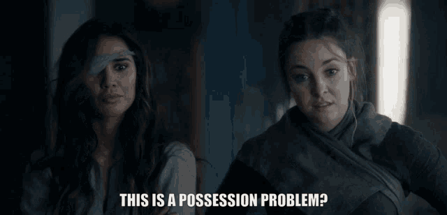 two women are standing next to each other with the words this is a possession problem