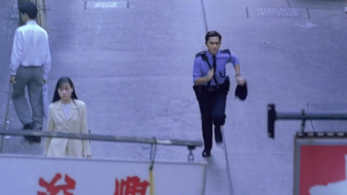 Running Police Officer GIF - Running Police Officer Tony Leung GIFs
