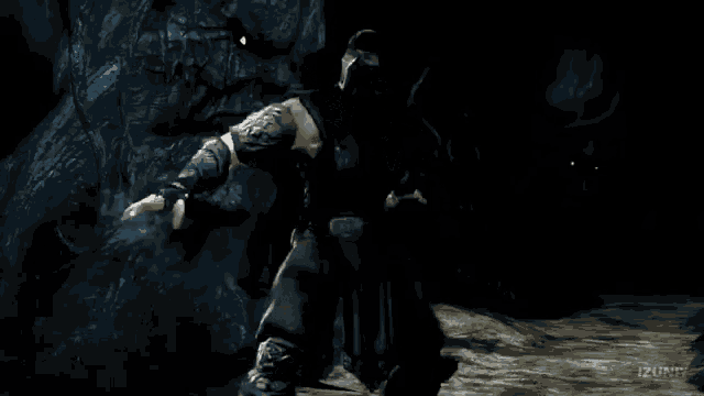 a man in a ninja costume is standing in front of a monster in a video game .