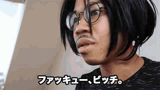 a man wearing glasses and a wig says bitch
