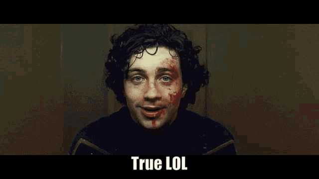 a man with blood on his face and the words true lol on the bottom