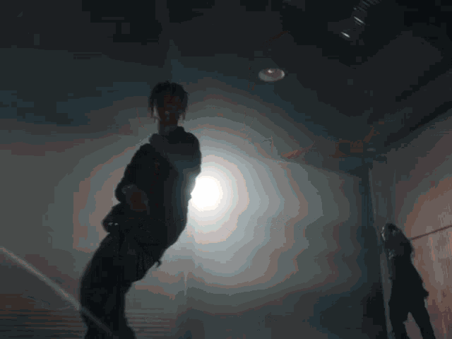 a blurry picture of a person walking in front of a door