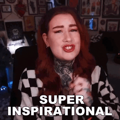 a woman with red hair says super inspirational