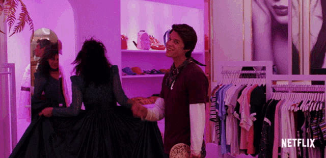 a netflix ad shows a man and woman dancing in a clothing store