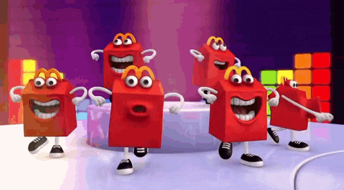 a group of happy meal toys are dancing together