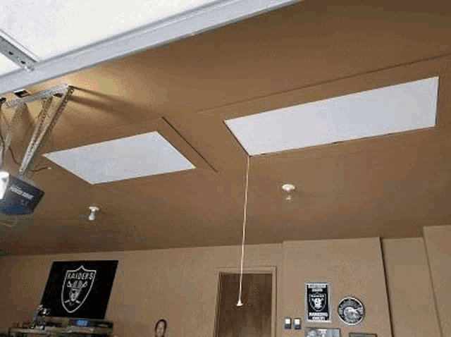a garage with a sign that says raiders on it .