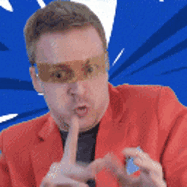 a man wearing sunglasses and a red jacket is making a gesture with his finger