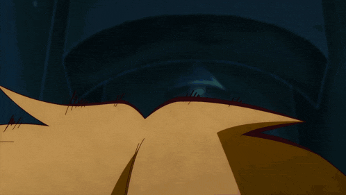 a close up of a person 's eyes with red rims