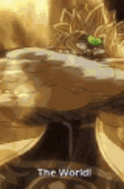 a close up of a table with a green leaf on it and the words `` the world '' on the bottom .