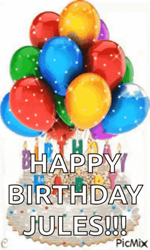 a birthday cake with a bunch of balloons and candles on it .