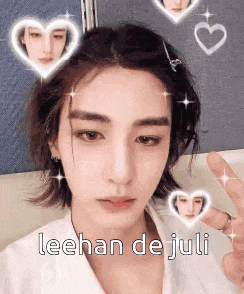 a close up of a person 's face with hearts around it and the words `` leehan de juli '' written on it .