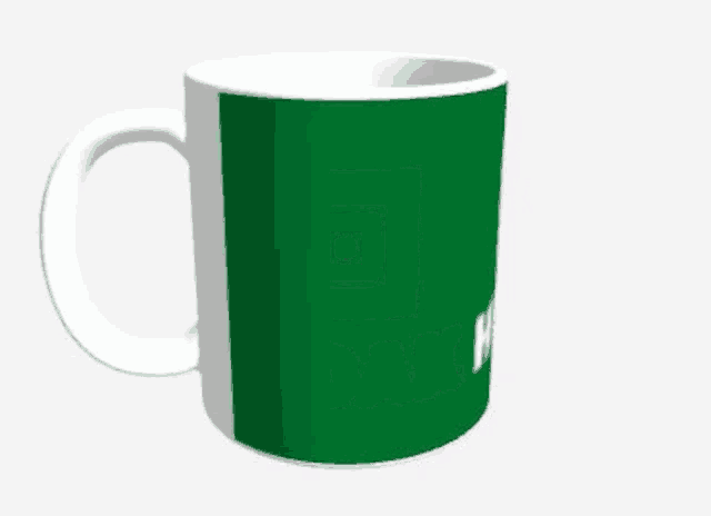 a green mug with a white handle and the word pak on it