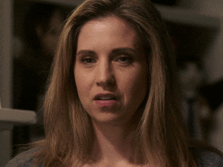 a woman says " i like myself " with her mouth wide open