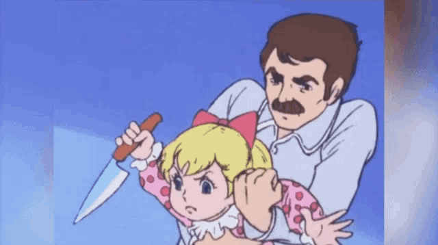 a man is holding a little girl in his arms and holding a knife .