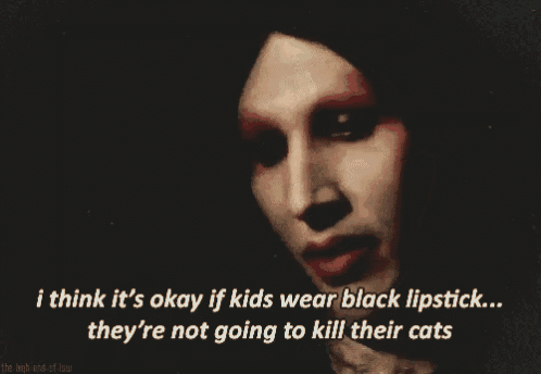 marilyn manson is wearing black lipstick and talking about kids